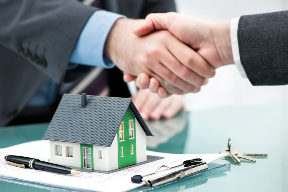 Handshake house key contract signing hands mortgage contract shutterstock 375747523